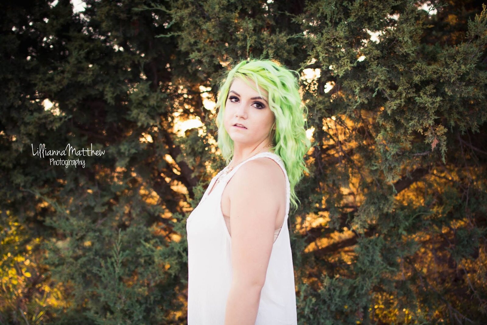 Side profile forest portrait with soft natural light