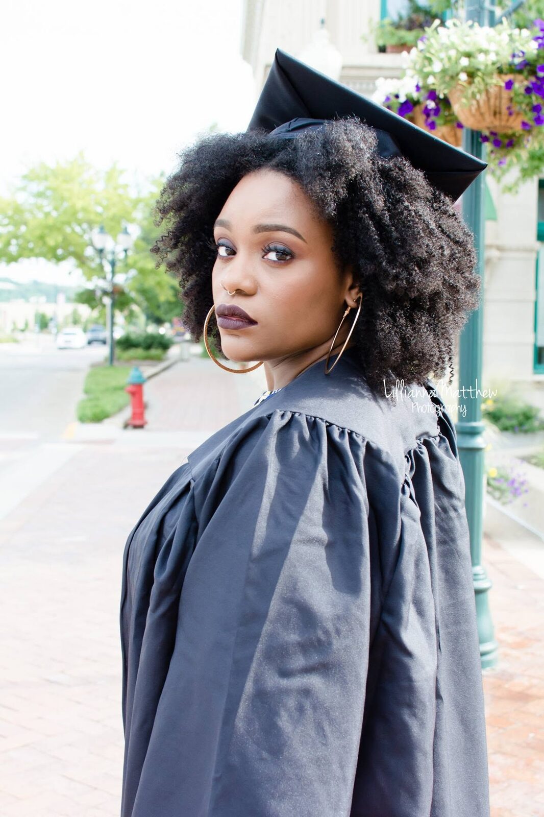 Classic graduation portrait in cap and gown