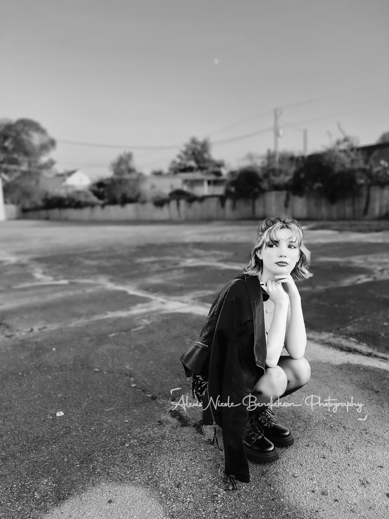 Close portrait of Lillia looking down, golden hour light